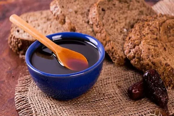 قیمت شیره خرما سنتی + مشخصات بسته بندی عمده و ارزان